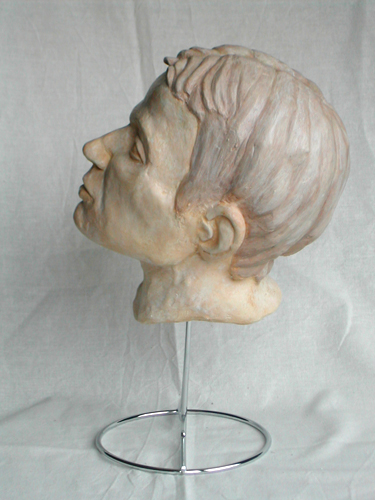 plaster cast of a portrait in clay
