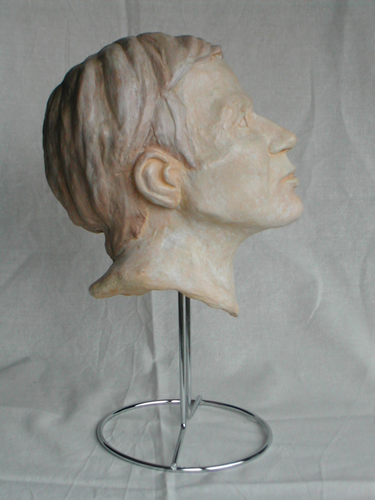 plaster cast of a portrait in clay